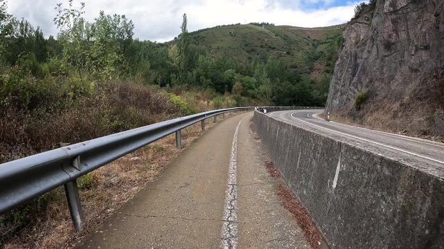 French Way of Saint James - pedestrian and cycle path along the N-6 road between Villafranca del Bierzo and Trabadelo, comarca of El Bierzo, province of Leon, Spain