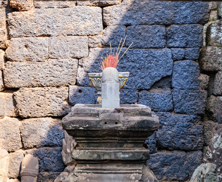 Incense holder in phallus base in temple in Wat Nokor, Cambodia