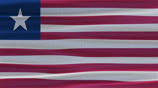 Liberia flag waving in the wind with high quality fabric texture