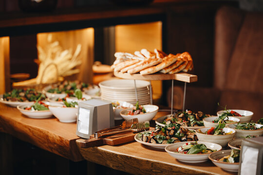 Buffet Table with Bread and Salads
