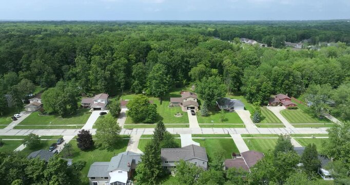 Aerial view of large private homes in Cleveland, Ohio residential area. New family houses as example of real estate development in USA suburbs.
