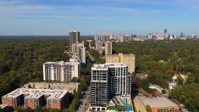 Atlanta, Georgia skyline with Buckhead uptown prominent buildings and roads stretching across the city. Modern urban infrastructure.