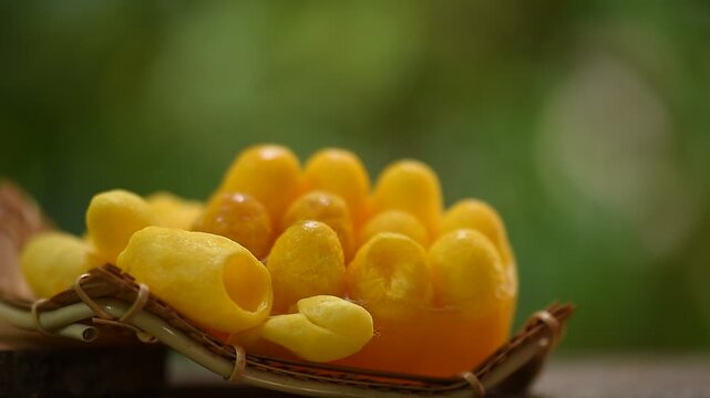 Silkworm soap and Silk cocoon facial scrub on natural background.