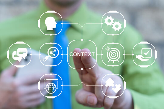 Concept of context. Business person using virtual touch screen presses the text CONTEXT.  Conceptual Social Business Context Analytic Learning.