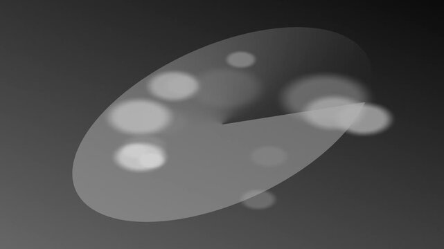 A grayscale image featuring a large, rounded rectangle with a subtle gradient effect, adorned with several white, circular bokeh spots against a darker background