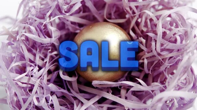 Animation of sale over gold bauble in violet straw