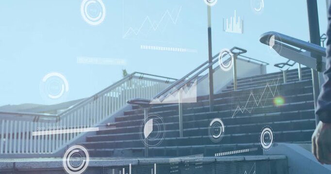 mature adult male stepping upward initiating technology data visuals on steps showing progress