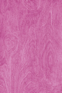 Pink color painted wooden texture with vertical natural grain pattern and smooth plywood surface. Rustic wallpaper, background, design element, backdrop