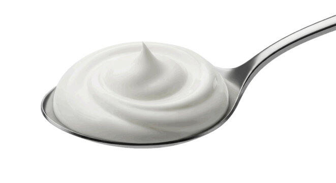 Creamy yogurt or sour cream swirl on a silver spoon on a transparent background