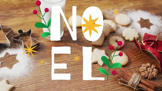 Animation of noel text over christmas cookies and decorations on wooden background