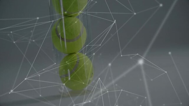 Three bright green tennis balls stacking inside clear tube, showing glowing digital network overlay