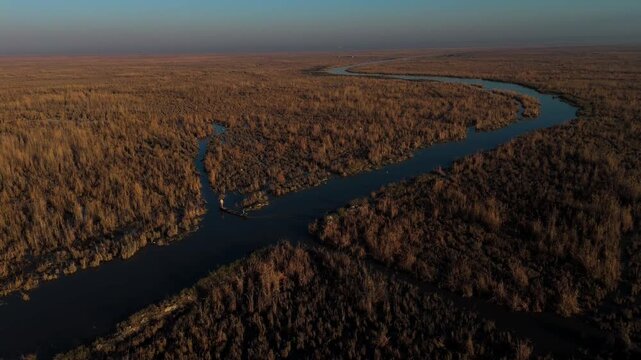 The Al-Jubaysh Marshes, located in Dhi Qar, Iraq, are part of the Mesopotamian marshlands, one of the world's largest wetland ecosystems. Known for their rich biodiversity, these marshes are home to u