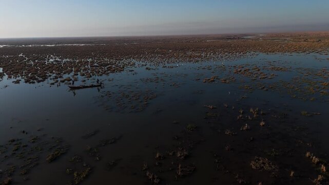 The Al-Jubaysh Marshes, located in Dhi Qar, Iraq, are part of the Mesopotamian marshlands, one of the world's largest wetland ecosystems. Known for their rich biodiversity, these marshes are home to u