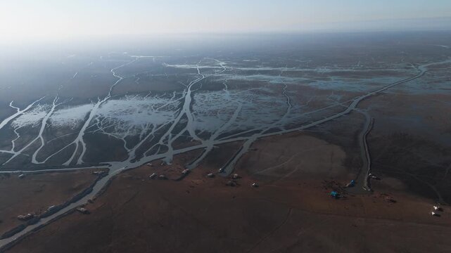 The Al-Jubaysh Marshes, located in Dhi Qar, Iraq, are part of the Mesopotamian marshlands, one of the world's largest wetland ecosystems. Known for their rich biodiversity, these marshes are home to u