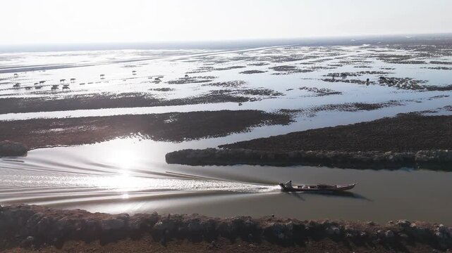 The Al-Jubaysh Marshes, located in Dhi Qar, Iraq, are part of the Mesopotamian marshlands, one of the world's largest wetland ecosystems. Known for their rich biodiversity, these marshes are home to u