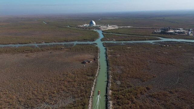 The Al-Jubaysh Marshes, located in Dhi Qar, Iraq, are part of the Mesopotamian marshlands, one of the world's largest wetland ecosystems. Known for their rich biodiversity, these marshes are home to u