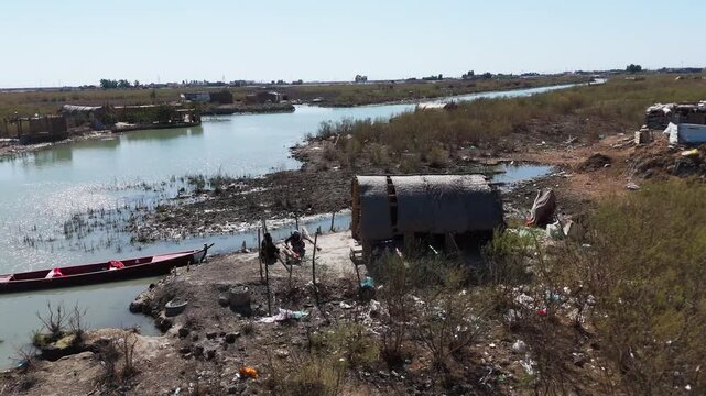 The Al-Jubaysh Marshes, located in Dhi Qar, Iraq, are part of the Mesopotamian marshlands, one of the world's largest wetland ecosystems. Known for their rich biodiversity, these marshes are home to u