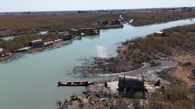 The Al-Jubaysh Marshes, located in Dhi Qar, Iraq, are part of the Mesopotamian marshlands, one of the world's largest wetland ecosystems. Known for their rich biodiversity, these marshes are home to u