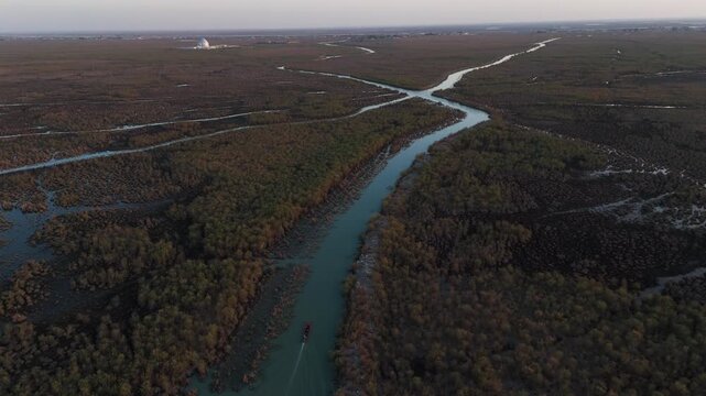 The Al-Jubaysh Marshes, located in Dhi Qar, Iraq, are part of the Mesopotamian marshlands, one of the world's largest wetland ecosystems. Known for their rich biodiversity, these marshes are home to u
