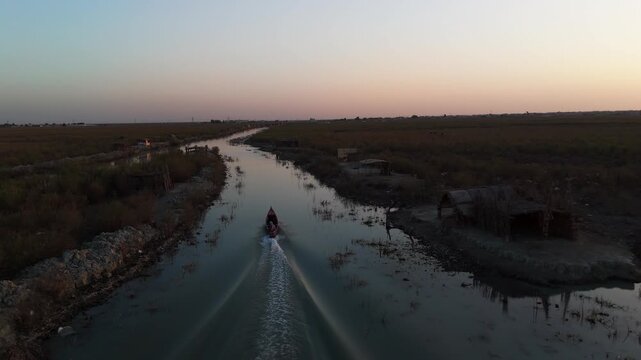 The Al-Jubaysh Marshes, located in Dhi Qar, Iraq, are part of the Mesopotamian marshlands, one of the world's largest wetland ecosystems. Known for their rich biodiversity, these marshes are home to u