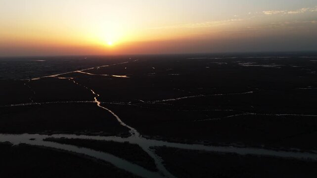 The Al-Jubaysh Marshes, located in Dhi Qar, Iraq, are part of the Mesopotamian marshlands, one of the world's largest wetland ecosystems. Known for their rich biodiversity, these marshes are home to u