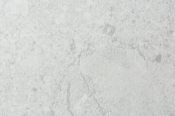 Fototapeta premium closeup view of close up textured stone countertop, white stone tile countertop with grey veins