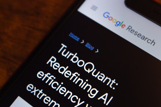Mexico City, MEXICO - Mar 31 2026 : Close-up of a smartphone displaying a Google Research blog post titled "TurboQuant: Redefining AI efficiency" on a dark-themed mobile browser.