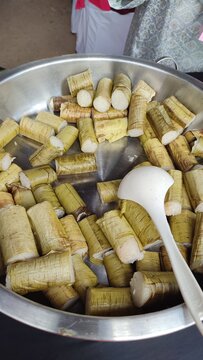 Traditional Malaysian lemang served fresh, a delicious glutinous rice delicacy cooked in bamboo with coconut milk.