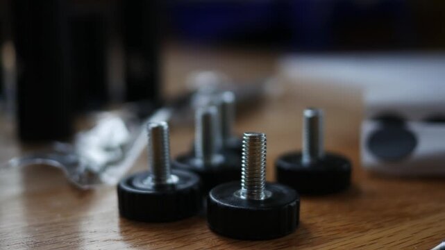 Building Desk Series - Screws and Knobs Organized on Floor
