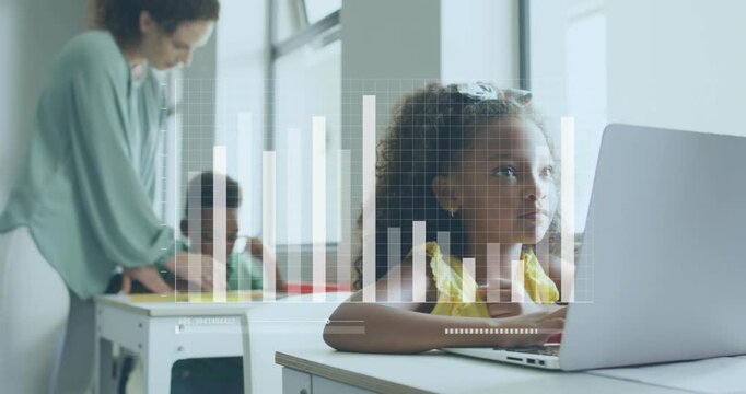 Vertical video: Pointing teacher guiding boy writing in class, girl in yellow typing on laptop, HUD
