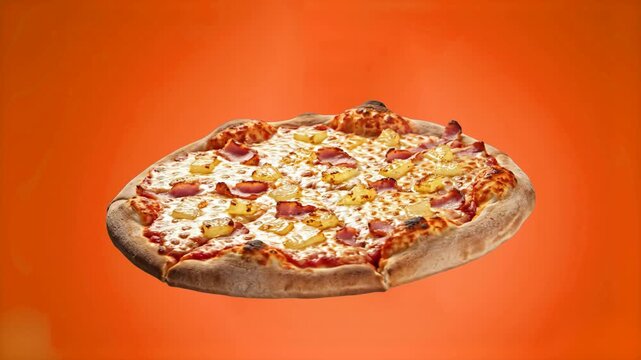A hot Hawaiian pizza with melted cheese, ham, and pineapple chunks rotating on a vibrant orange background. Perfect for appetizing food commercials and social media marketing.