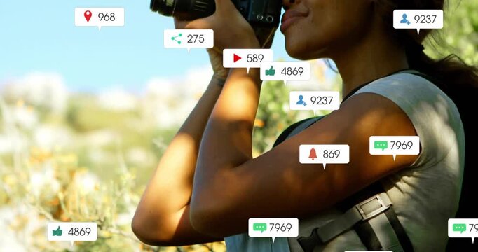 Female shooter raising DSLR, pressing shutter, spawning badges around lens and torso for marketing