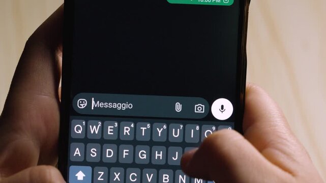 Person Typing "Ciao! :)" Italian Greeting on Smartphone