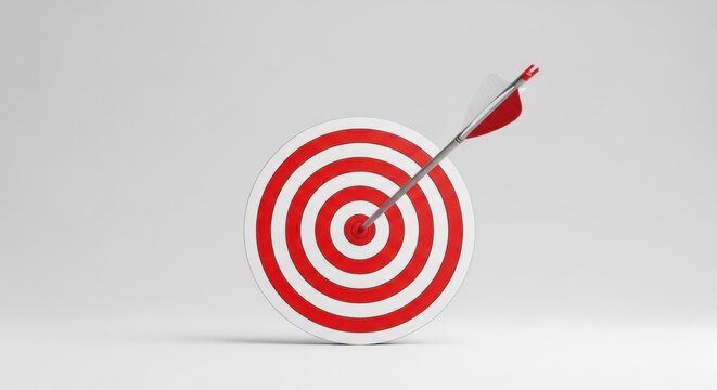 A red dart with a white bullseye, hitting the center of a red dartboard, with a white background and a single dart in the center.
