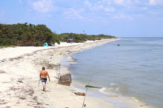 Walking on the beach, fishing roads