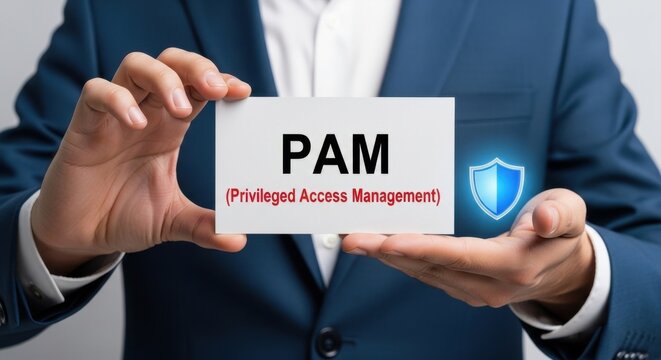 Businessman holding PAM Privileged Access Management card, cybersecurity concept, blue suit, security symbol