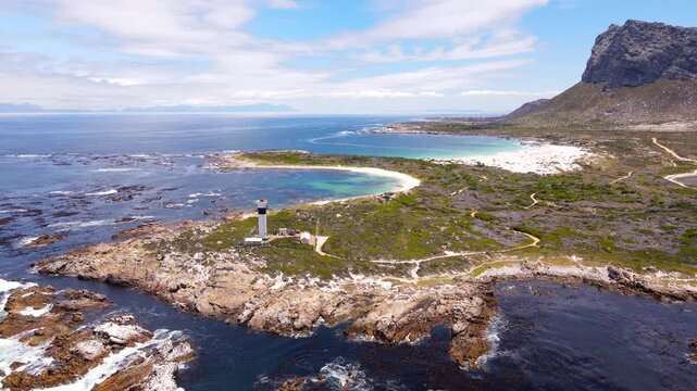 Cape Hangklip lighthouse and scenic Moonlight Beach, Pringle Bay. Drone riser