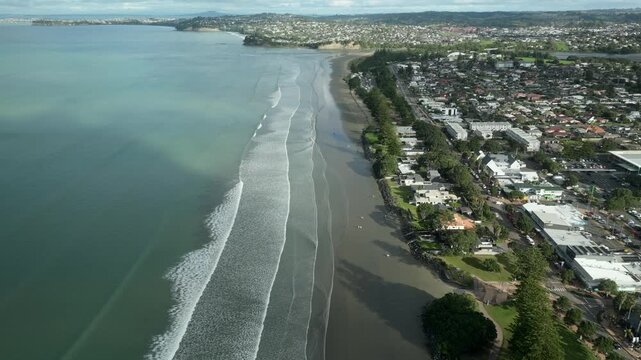 Aerial View of Orewa Beach with Distant Rangitoto Island in Auckland, NZ
