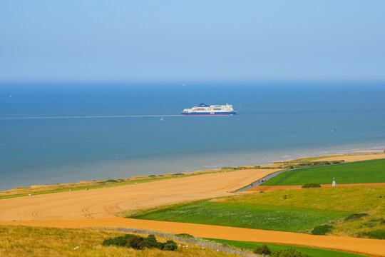 Panoramic view of a DFDS ferry on the English Channel seen from the fields of Cap Blanc-Nez, France