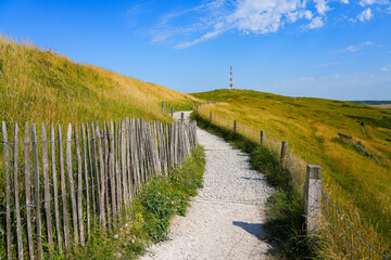 Fototapeta premium Hiking path and radio antenna on the rolling hills of Cap Blanc-Nez, Opal Coast, France