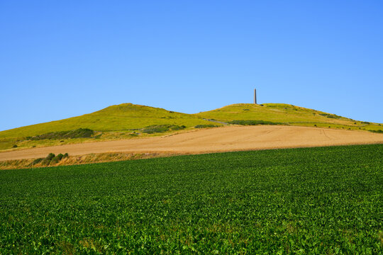 The Dover Patrol Monument obelisk standing on the rolling hills of Cap Blanc-Nez, France