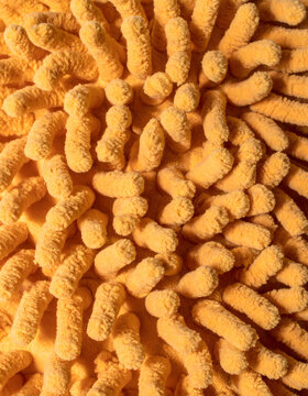 Macro Shot of Soft Fluffy Yellow Chenille or Microfiber Texture Background
