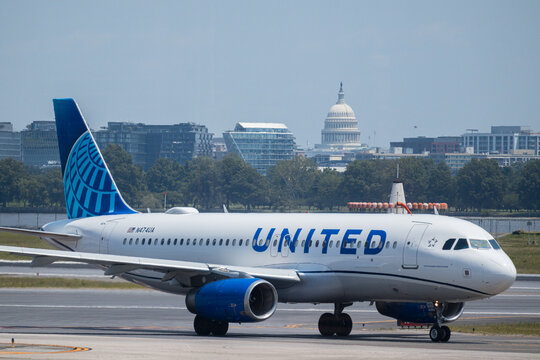 15th of July 2025 United Airlines Airbus taking off with US Capitol in background, Washington DC skyline, JFK airport. g.
