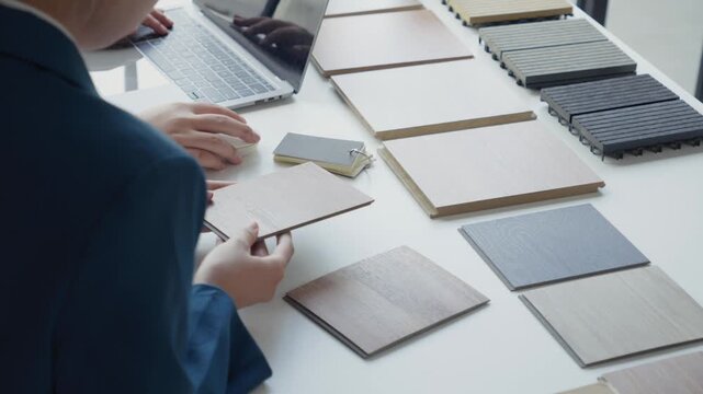 Two Interior Designers Collaborating in Office