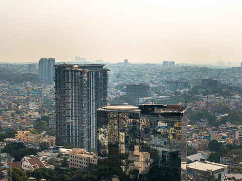 Aerial view of the modern high-rise skyscrapers in Bengaluru, Karnataka, showcasing the city's dynamic skyline. Cityscape highlights Bengaluru's blend of urban development and architectural brilliance