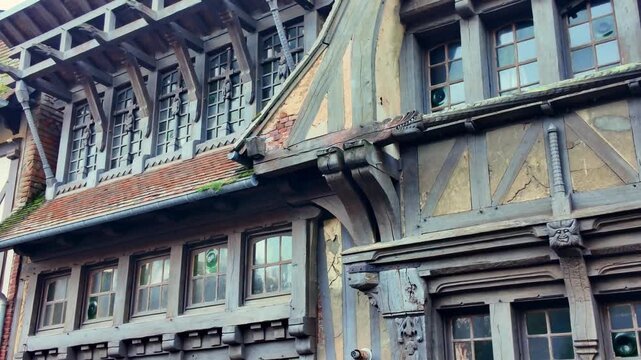 Details of an old, weathered medieval half-timbered house, a historic building in the town of &Eacute;tretat, Normandy, France