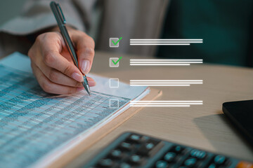 Business professional completing checklist on financial document with pen, representing audit, data verification, accounting process, and task management. Accuracy, compliance, and workflow