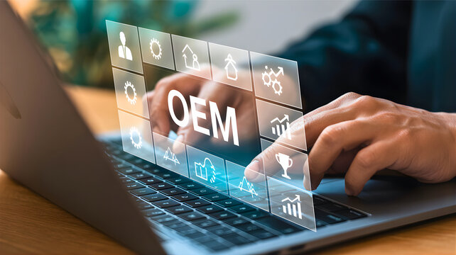 Hands interacting with virtual OEM interface on laptop, symbolizing digital business transformation, strategic manufacturing, and modern technology solutions