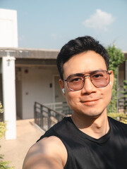 Obraz premium Bright summer afternoon with smiling man surrounded by beautiful nature