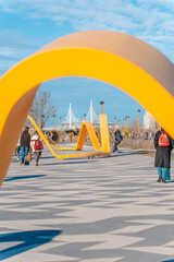 Fototapeta premium Beautiful modern urban outdoor park in spring. Saint Petersburg, Russia - 16 March 2026